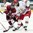 SPISSKA NOVA VES, SLOVAKIA - APRIL 23: Artyom Baltrik #9 of Belarus goes to play the puck while Latvia's Deniss Smirnovs #10 defends during relegation round action at the 2017 IIHF Ice Hockey U18 World Championship. (Photo by Steve Kingsman/HHOF-IIHF Images)

